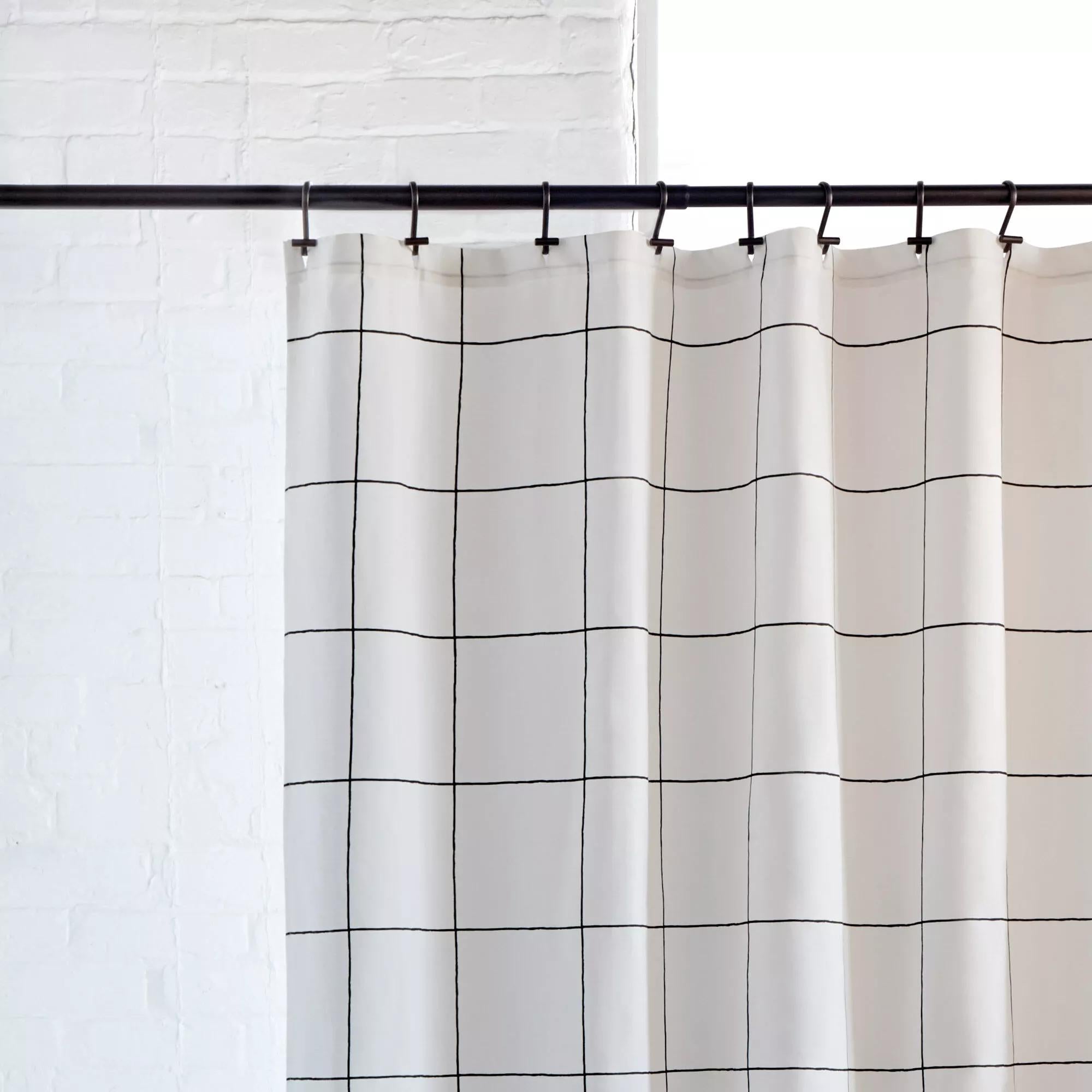Pôle à rideau de douche
