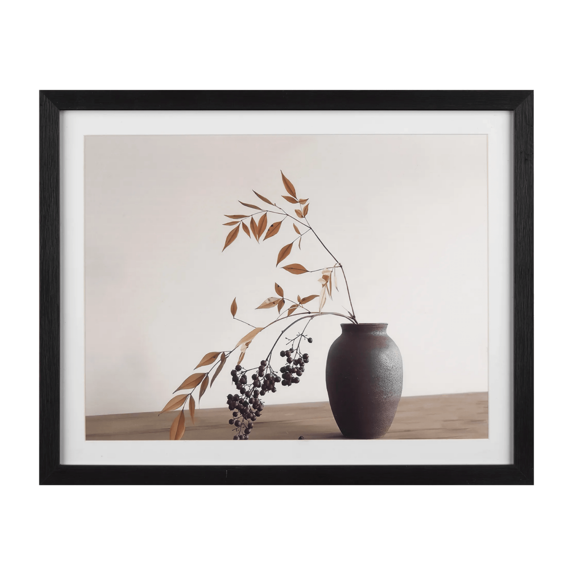 Cadre imprimé feuilles dans un vase noir