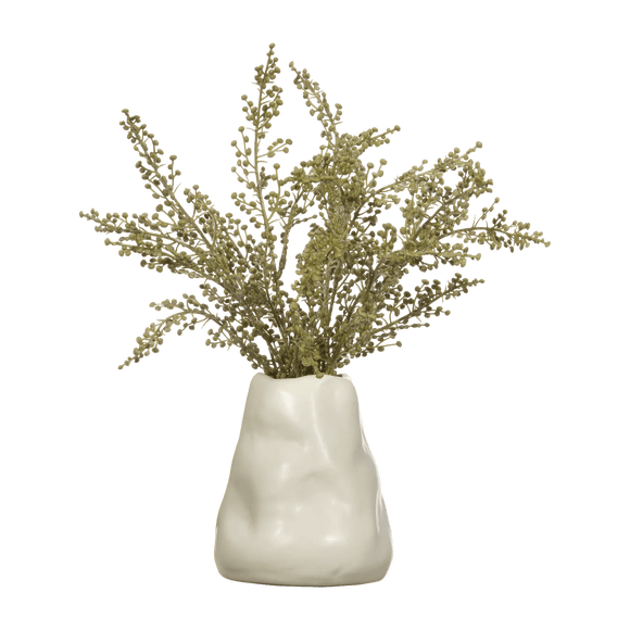 Stoebe artificiel dans un vase en céramique