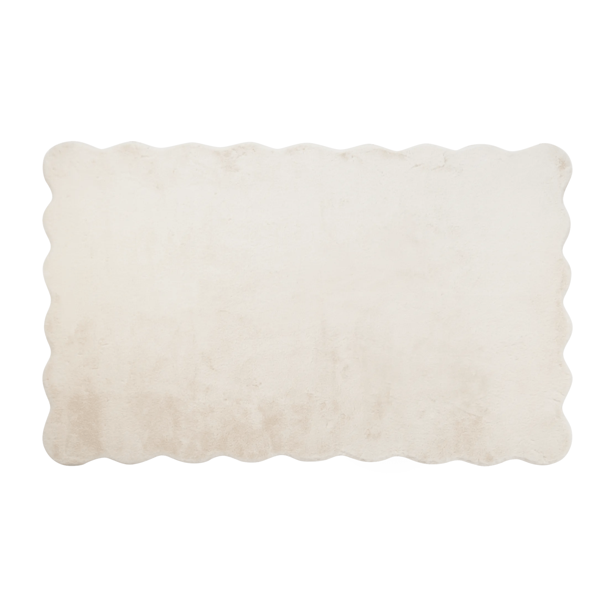 Tapis en fourrure festonnée blanc cassé